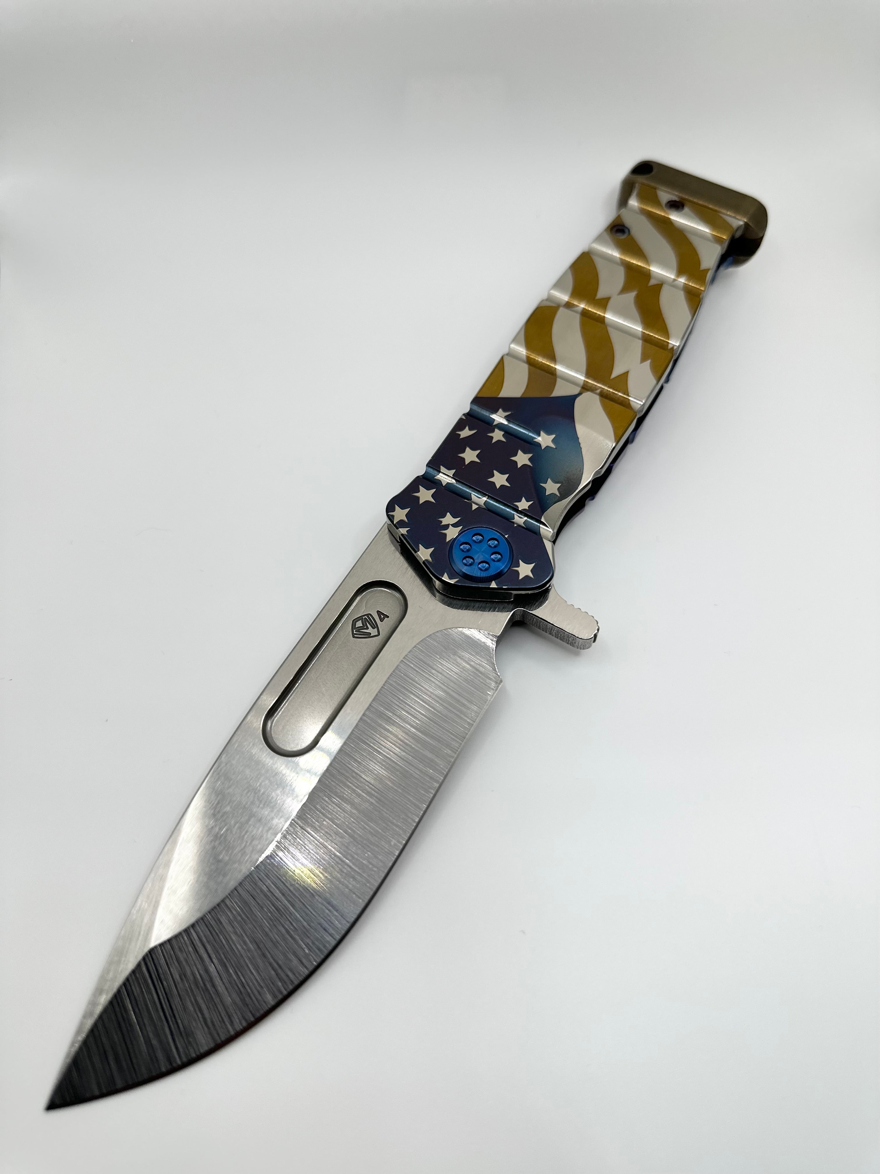 Medford Knife USMC Fighter Flipper S45VN Tumbled Blade, Tumbled Billowing Flag Handle, Blue Spring & HW, Bronze Clip & Pommel