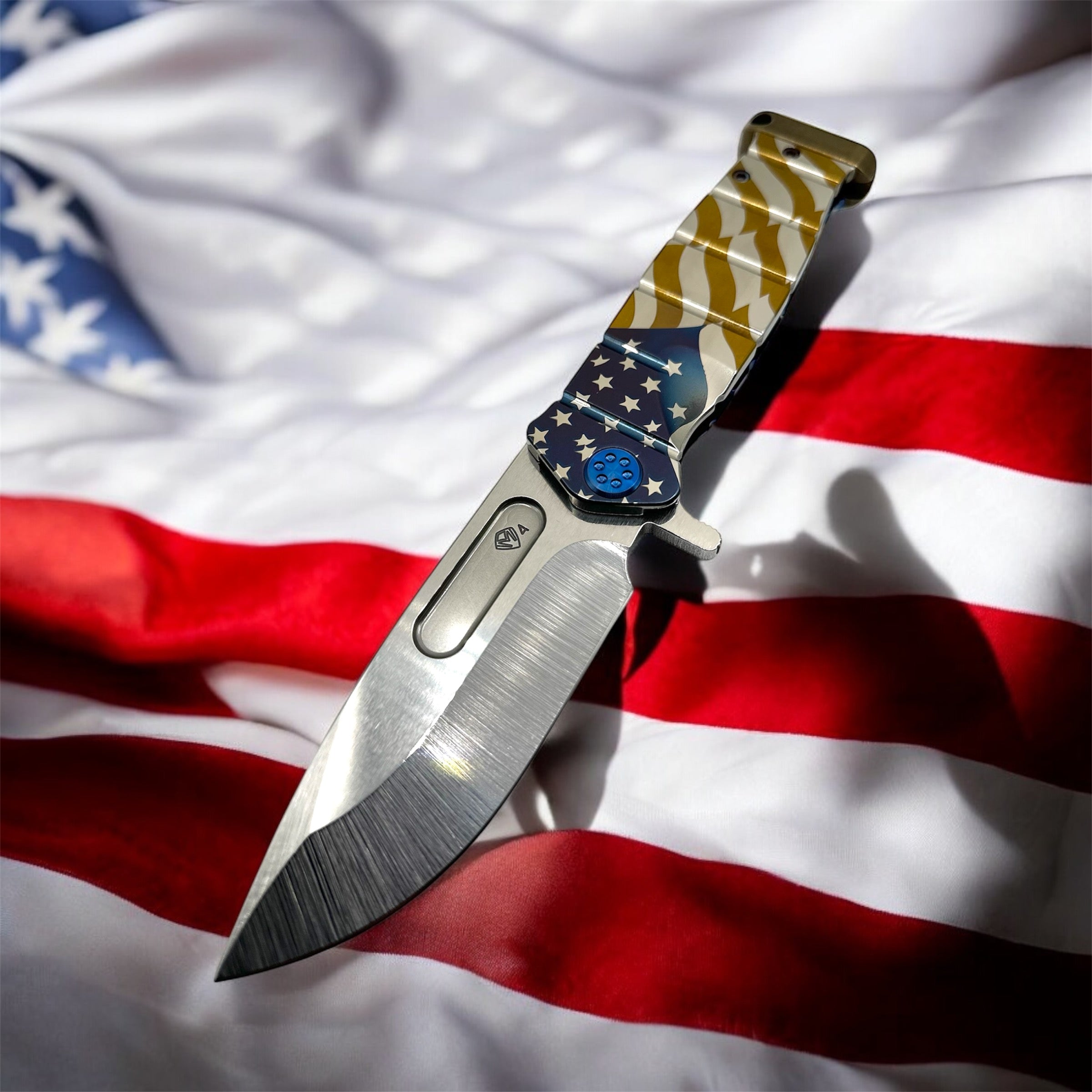 Medford Knife USMC Fighter Flipper S45VN Tumbled Blade, Tumbled Billowing Flag Handle, Blue Spring & HW, Bronze Clip & Pommel